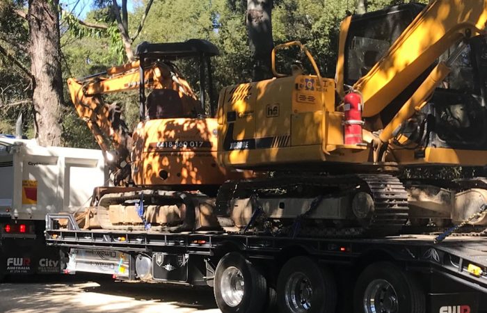 excavator machinery floating float hire gold coast